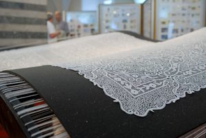 A replica of a 6 sqm lace tablecloth, ordered and made in 1976 by 14 Idrija lacemakers from 34,560 meters of cotton thread for Tito's wife Jovanka, who never received the gift. It was exhibited at the <!--LINK'" 0:214--> in 2008. Author: Jani Peternelj