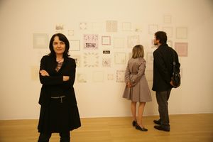 <!--LINK'" 0:135--> in front of her artistic intervention at the <i>AT HOME: Architects France and Marta Ivanšek</i> exhibition; <!--LINK'" 0:136-->, 2010