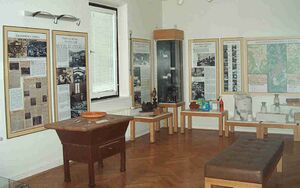 Artifacts from the Industrial collection, <!--LINK'" 0:105-->, documenting related industry that grew around the core business of mining, such as lime, glass, cement, brick, machining, chemical industry